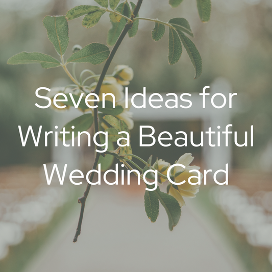 Wedding alter in the background of white florals with greenery. There is an opaque blog/green overlay with the text "Seven Ideas for Writing a Beautiful Wedding Card".